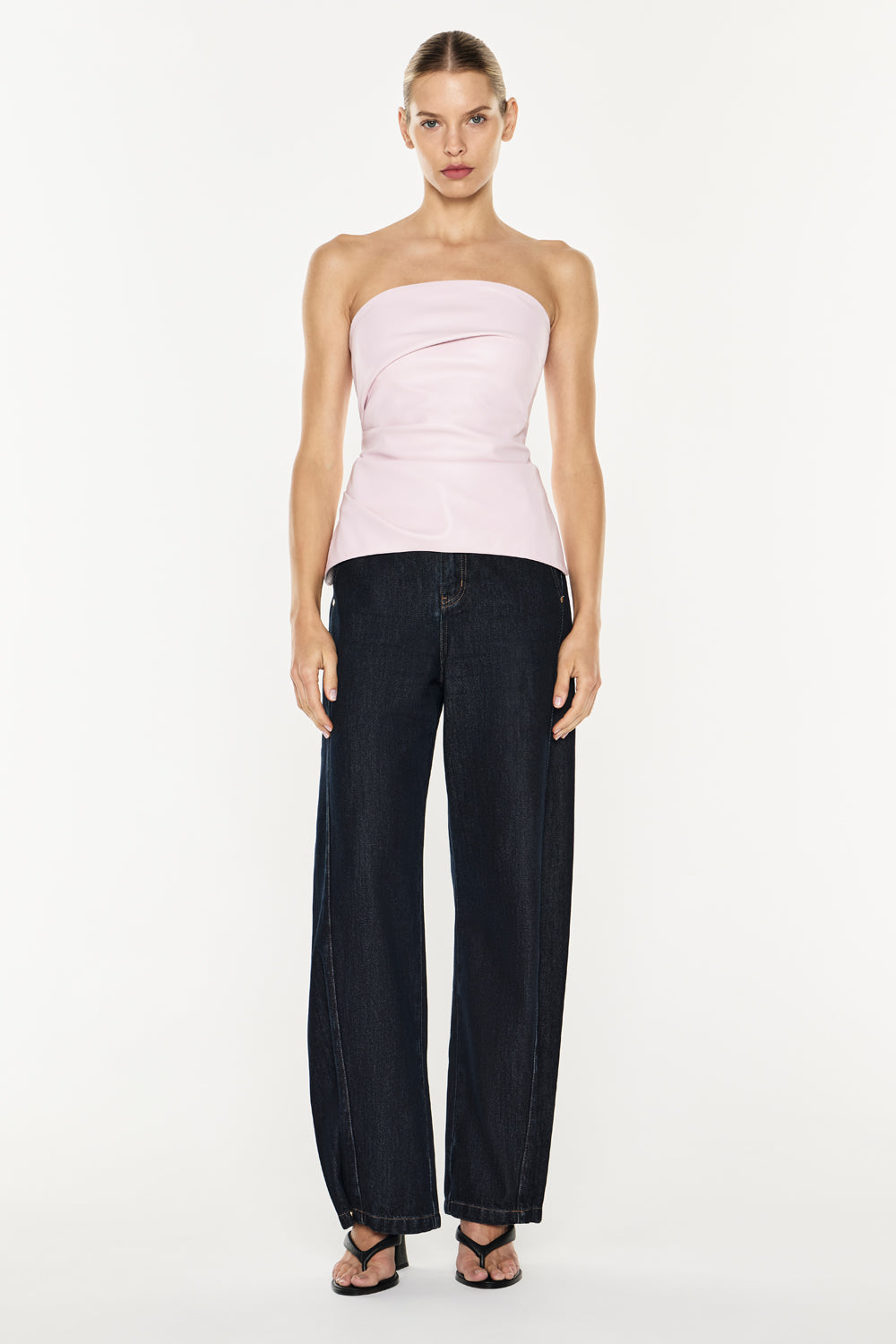 Image of a model wearing Tops. Product name - Limitless Love Bustier in Pink colour by brand - MANNING CARTELL