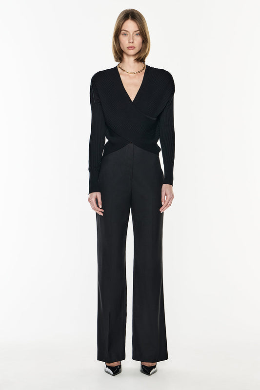 Image of a model wearing Pants. Productname: Major Suit High Waisted Pant in Black colour by brand - Manning Cartell
