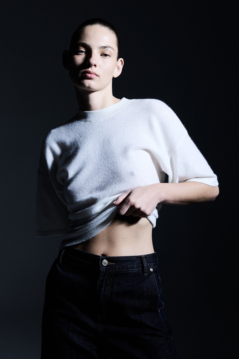 Image of a model wearing Tops. Productname: Light Years Knit Top in Ivory colour by brand - Manning Cartell