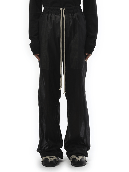 Image of a model wearing Pants. Productname: RICK OWENS Dietrich Drawstring in Black colour by brand - RICK OWENS