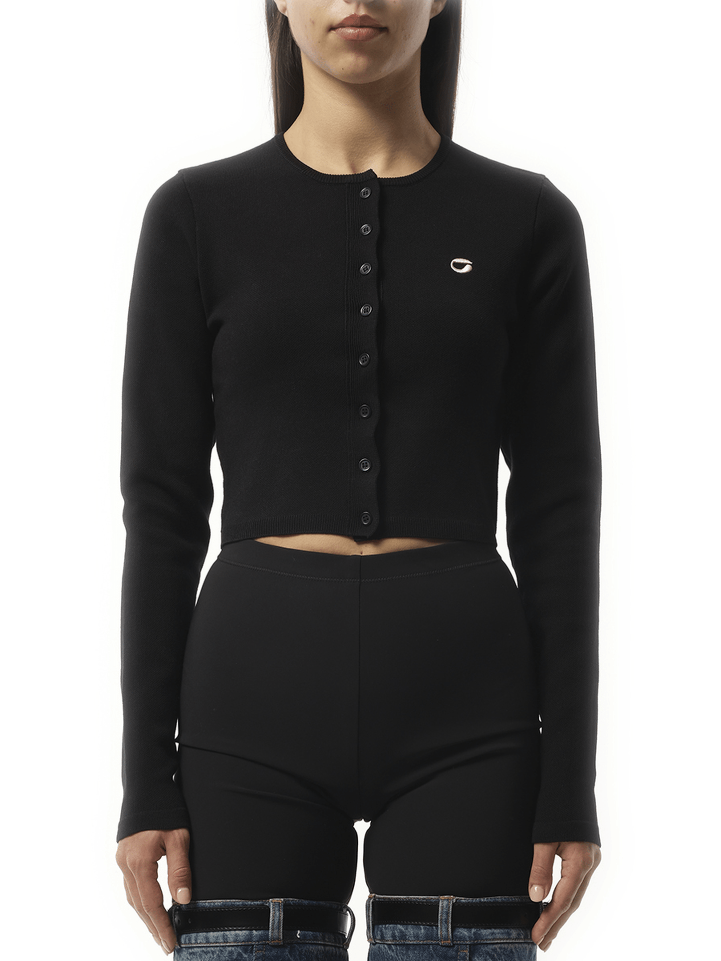 Image of a model wearing Outerwear. Productname: COPERNI Knitted Cardigan in Black colour by brand - COPERNI