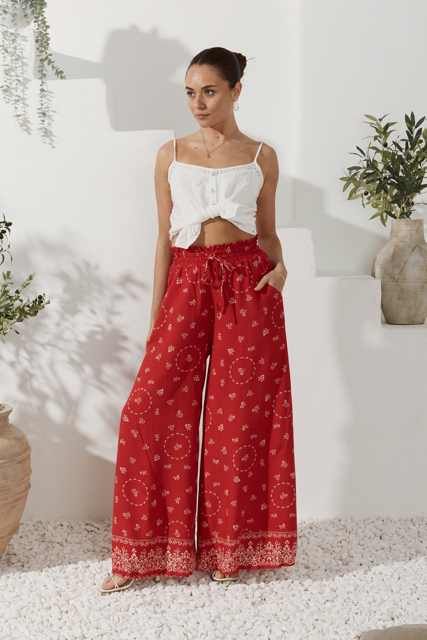 Image of a model wearing Pants. Productname: Heychic Elowen Boho Wide Leg Pants in Red colour by brand - Heychic