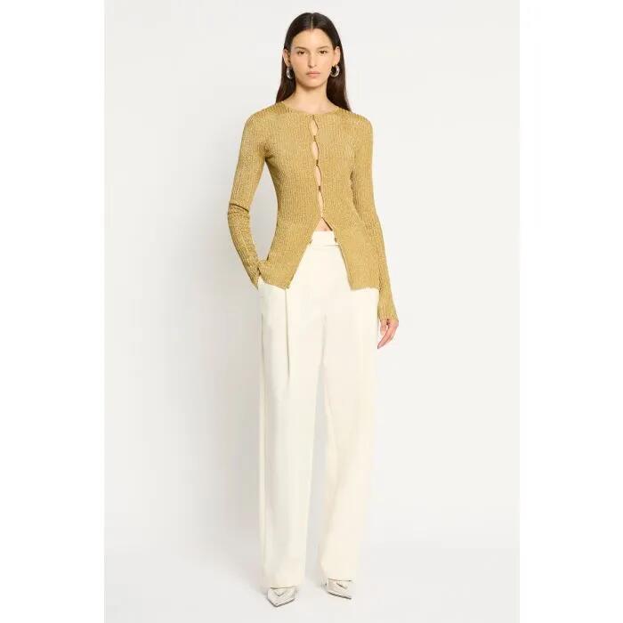 Image of a model wearing Outerwear. Productname: Shimmer Nights Cardi in Gold colour by brand - sass and bide