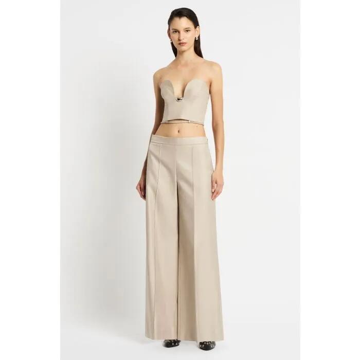 Image of a model wearing Tops. Productname: Ascend Again Bodice in Sand colour by brand - sass and bide