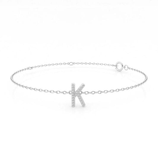 Image of Bracelets. Productname: Brilliant Claw Initial Chain Bracelet with 0.05tw of Diamonds in Sterling Silver in Diamond colour by brand - Bevilles