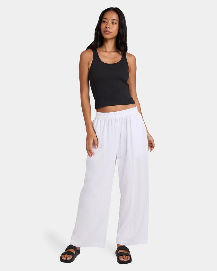 Image of a model wearing Pants. Product name - Billabong Womens Follow Me Pants White in White colour by brand - Billabong
