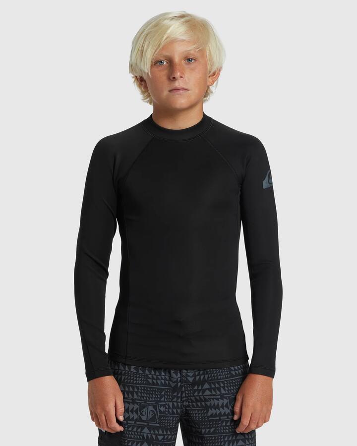Image of a model wearing Tops. Product name - Quiksilver Boys 2-7 Everyday Heat Long Sleeve Upf 50 Rash Vest Black in Black colour by brand - Quiksilver