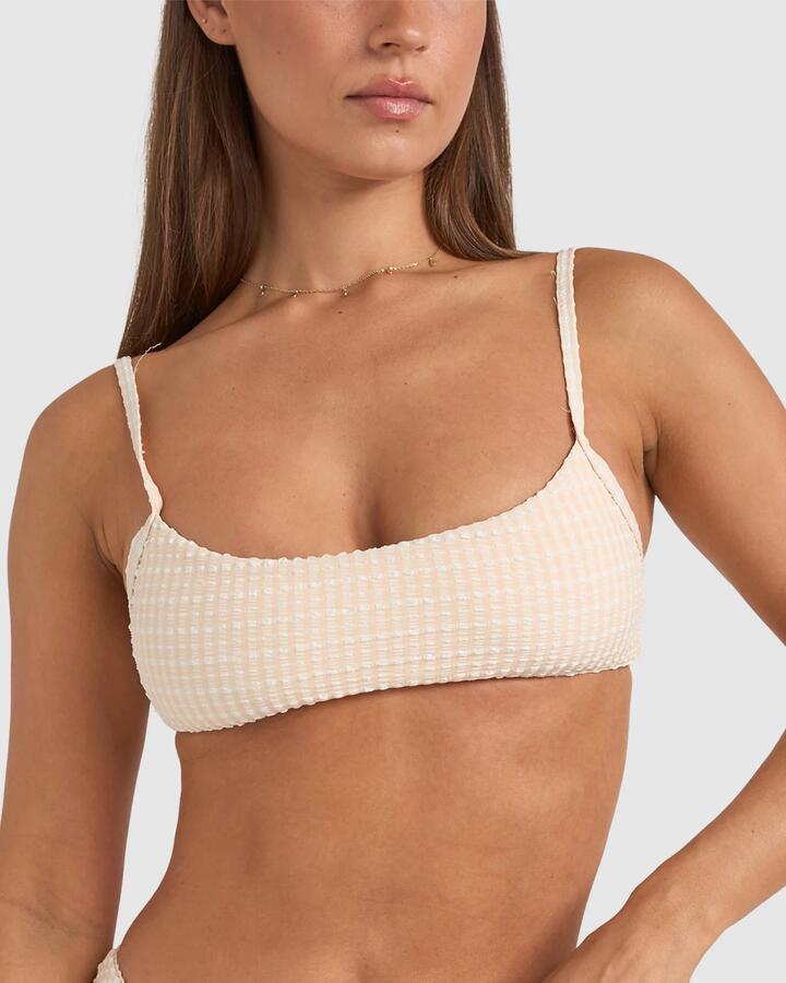 Image of a model wearing Tops. Productname: Rhythm - Womens Malibu Crop Top - Cream - in Cream colour by brand - Rhythm