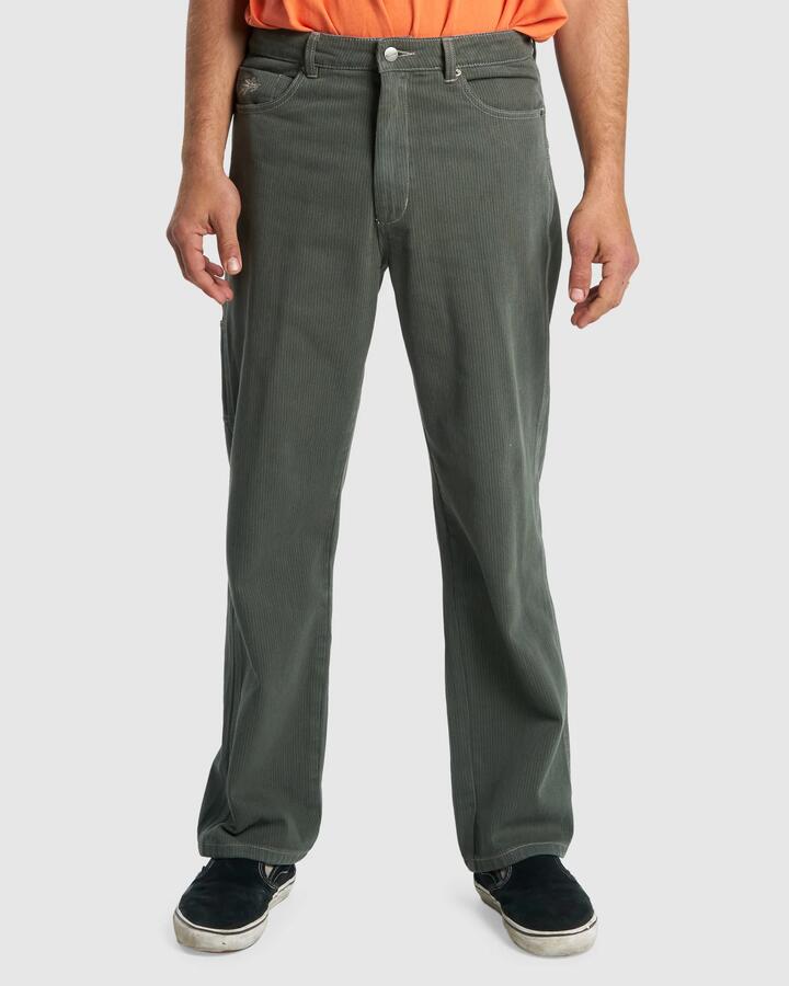 Image of a model wearing Pants. Productname: Worship Mens Sawn Carpenter Pant Pine Needle - in Pine Needle colour by brand - Worship