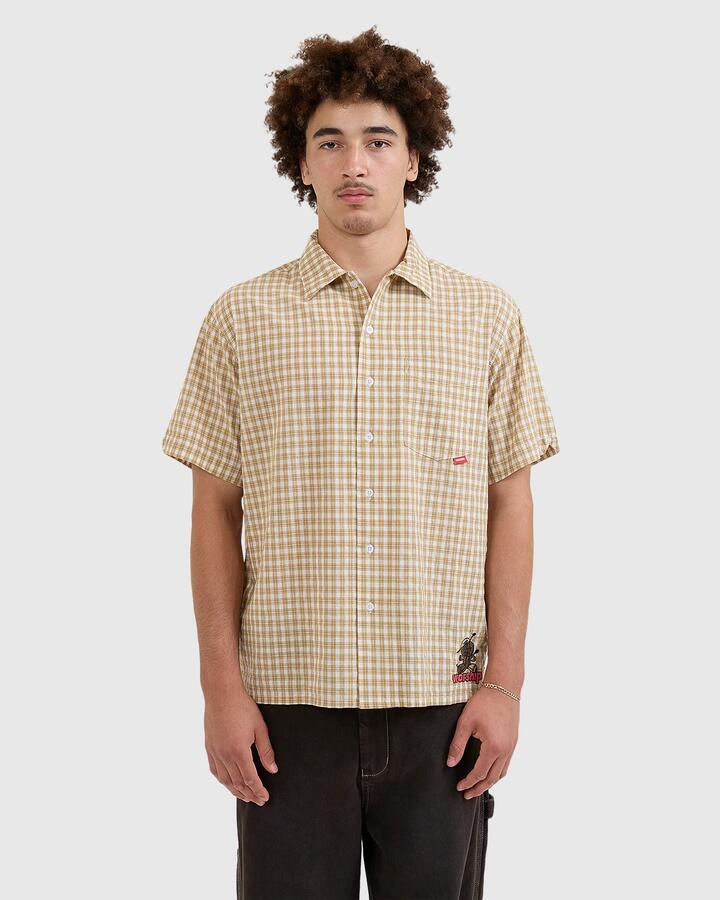 Image of a model wearing Tops. Productname: Worship - Mens Dejavoodoo Short Sleeve Shirt - Yellow - in Yellow colour by brand - Worship