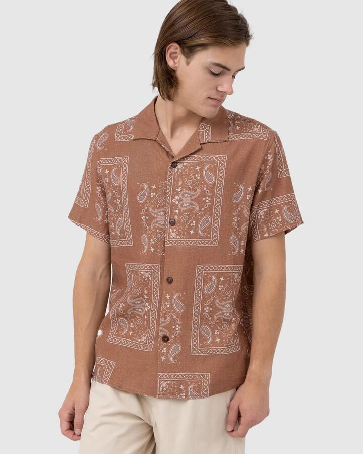 Image of a model wearing Tops. Productname: Rhythm - Mens Border Short Sleeve Shirt - Cedar - in Cedar colour by brand - Rhythm