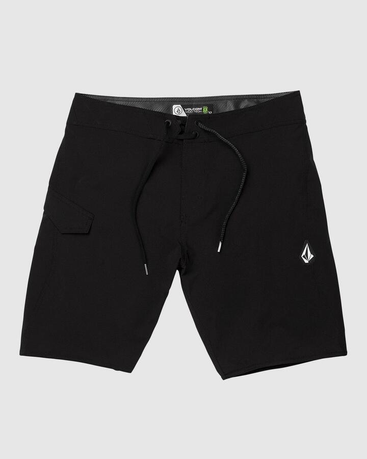 Image of a model wearing Shorts. Product name - Volcom Mens Lido Solid Mod 20" Boardshort Black in Black colour by brand - Volcom