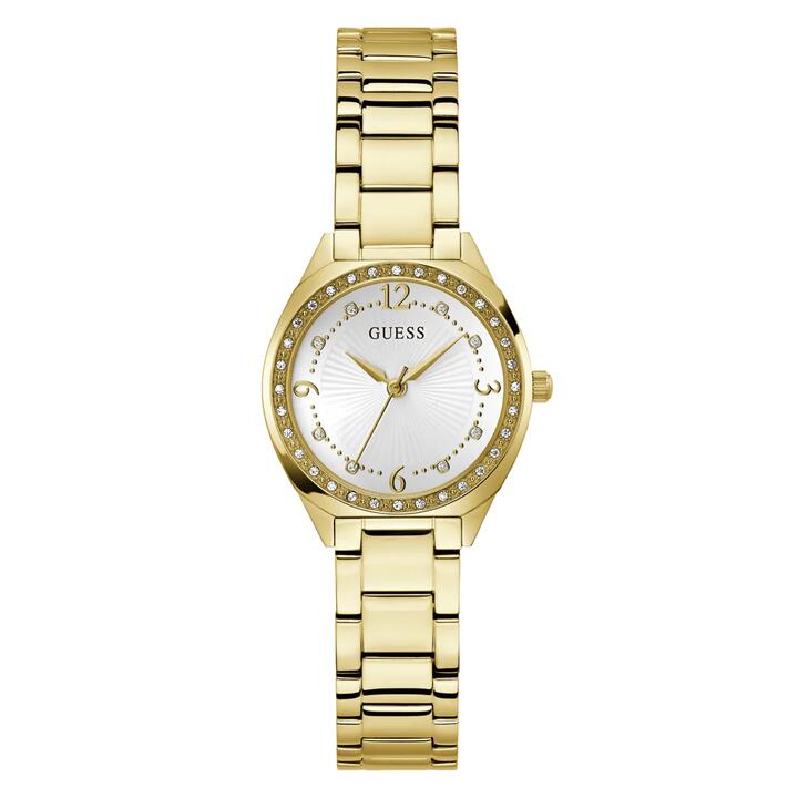 Image of a model wearing Dress. Productname: Guess Dress Charlotte Dress Gold-Tone Crystal Bezel Women's Watch GW0767L2 in Watch colour by brand - Guess