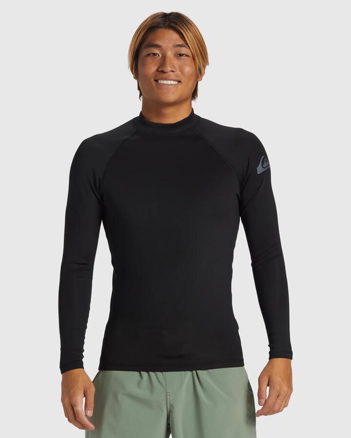 Image of a model wearing Tops. Product name - Quiksilver Mens Everyday Heat Long Sleeve Upf 50 Rash Vest Black in Black colour by brand - Quiksilver