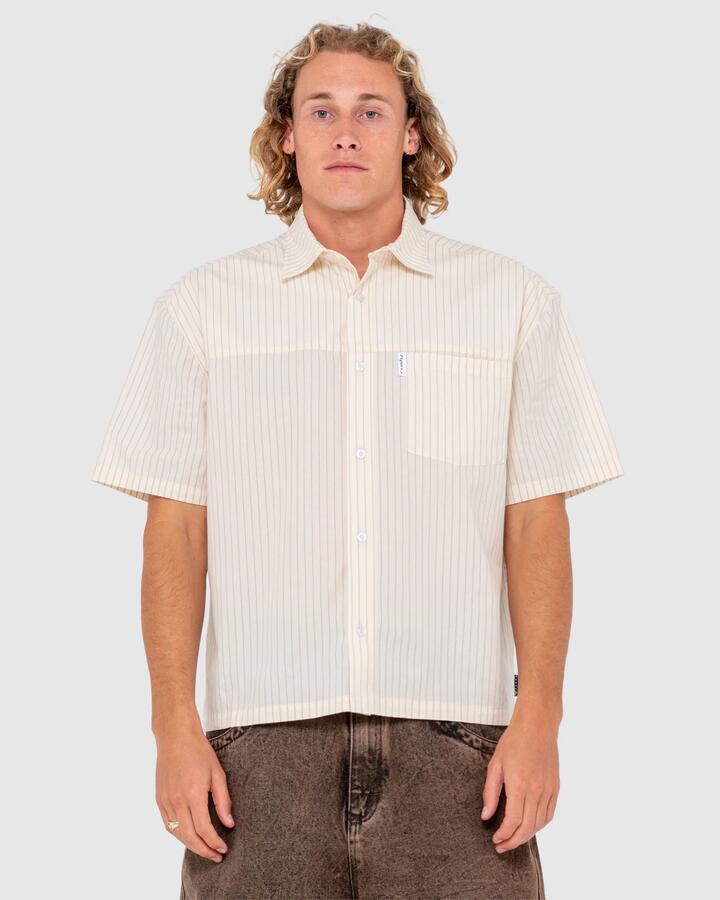 Image of a model wearing Tops. Productname: Rusty - Mens Boxed In Short Sleeve Shirt - Ecru - in Ecru colour by brand - Rusty