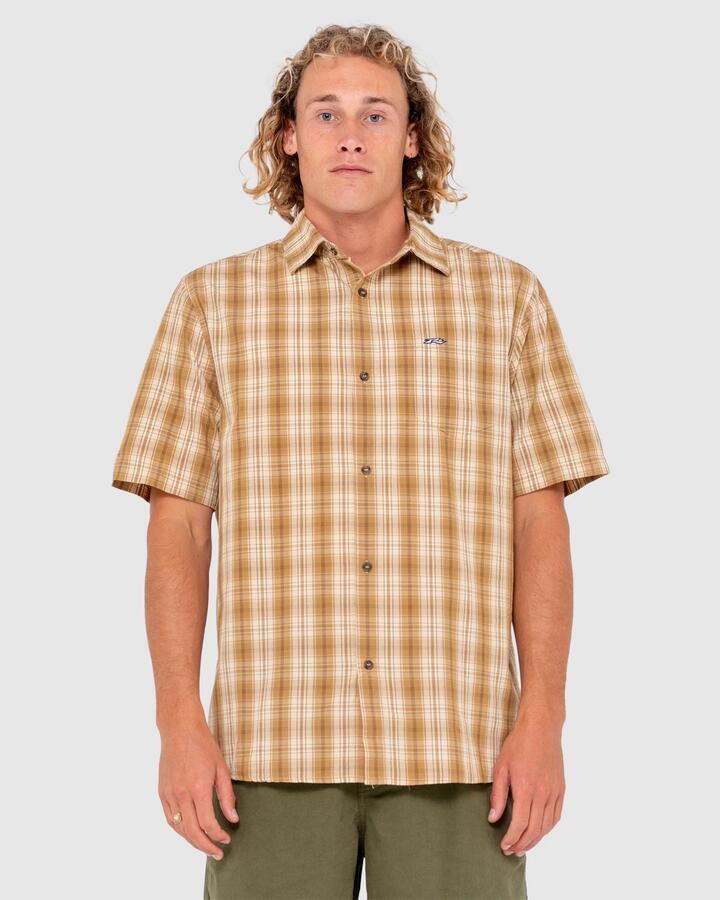 Image of a model wearing Tops. Product name - Rusty Mens Datsun Check Short Sleeve Shirt Java in Java colour by brand - Rusty