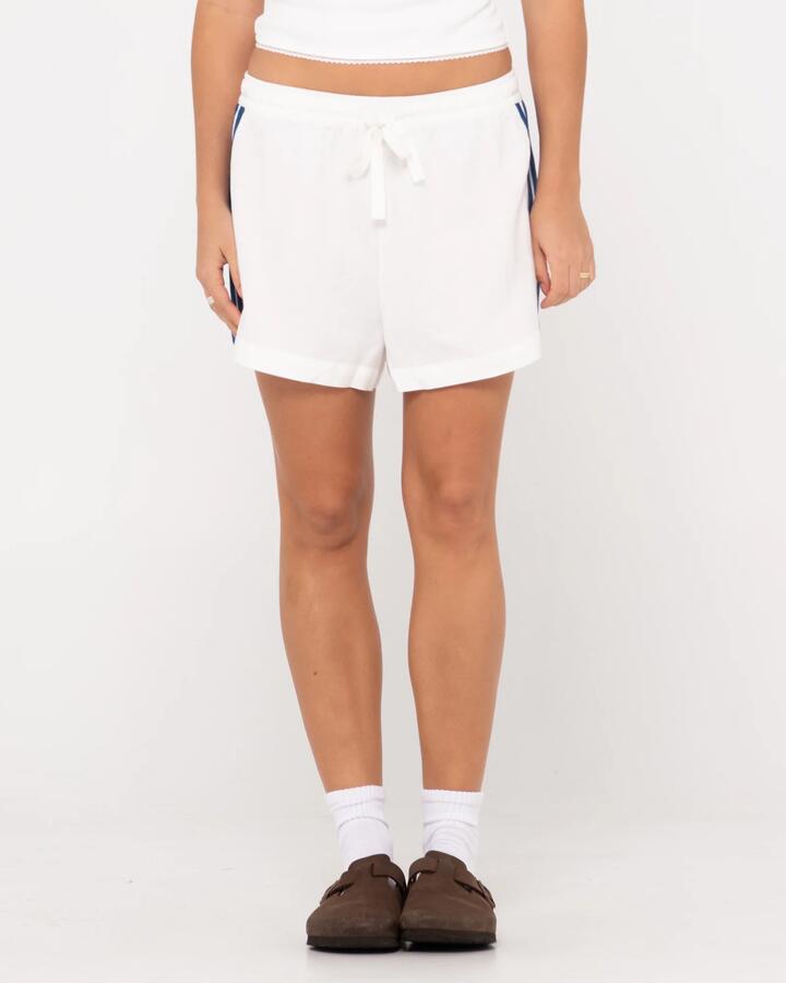 Image of a model wearing Shorts. Productname: Rusty - Womens Palm Springs Comp Lounge Shorts - Snow - in Snow colour by brand - Rusty