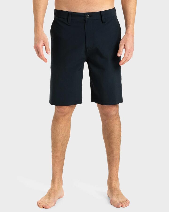 Image of a model wearing Shorts. Product name - Quiksilver Mens Union Amphibian 20" Hybrid Shorts Black in Black colour by brand - Quiksilver