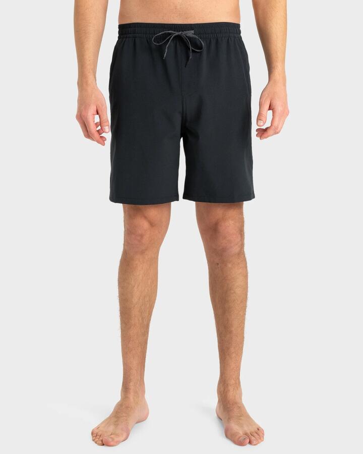 Image of a model wearing Shorts. Product name - Quiksilver Mens Taxer Amphibian 18" Hybrid Shorts Black in Black colour by brand - Quiksilver