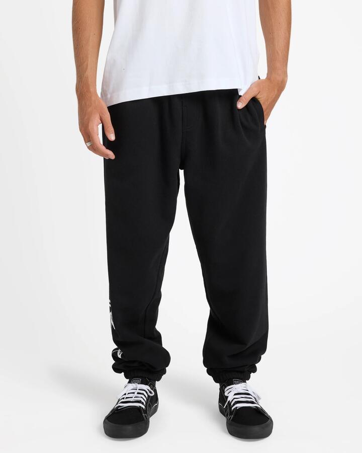 Image of a model wearing Pants. Productname: Billabong - Mens J Bay Trackpants - Black - in Black colour by brand - Billabong