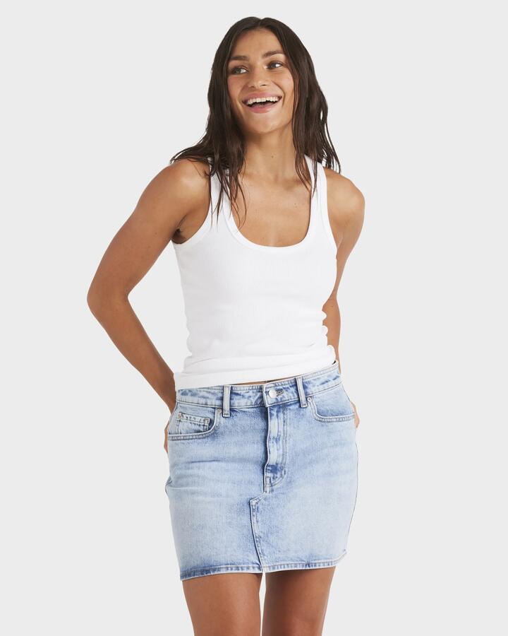 Image of a model wearing Skirts. Productname: Roxy Womens Shine Denim Skirt Beau Blue - in Beau Blue colour by brand - Roxy