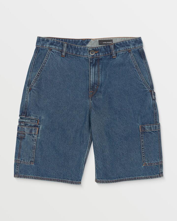 Image of a model wearing Shorts. Productname: Volcom Mens 1991 Utility Denim Shorts Indigo Ridge Wash - in Indigo Ridge Wash colour by brand - Volcom