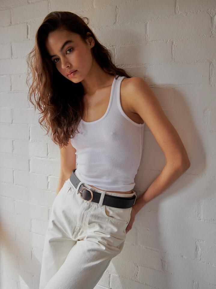 Image of a model wearing Tops. Productname: Beyond Her Carmen Tank Top in White colour by brand - Beyond Her