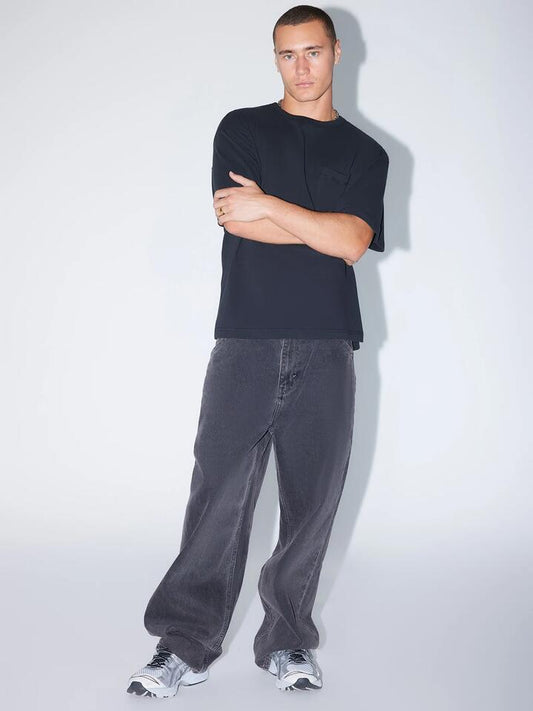 Image of a model wearing Denim. Productname: Abrand A6 Big Baggy Bazza in Washed Black colour by brand - Abrand
