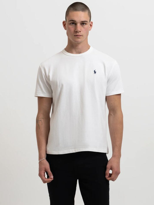 Image of a model wearing Tops. Productname: Polo Ralph Lauren Heavyweight T-Shirt in White colour by brand - Polo Ralph Lauren