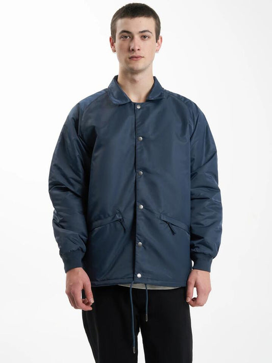 Image of a model wearing Outerwear. Productname: Thrills Wisdom Jacket in Petrol colour by brand - Thrills