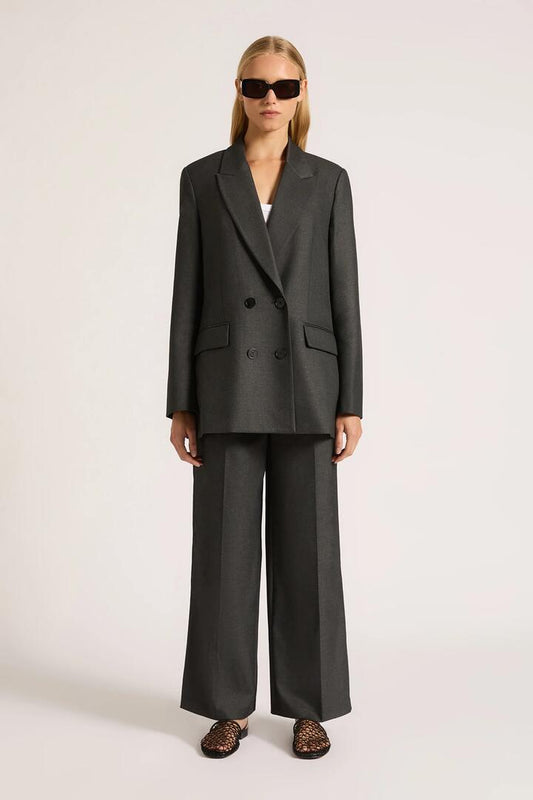 Image of a model wearing Outerwear. Productname: Nude Lucy Dakota Blazer in Charcoal colour by brand - Nude Lucy