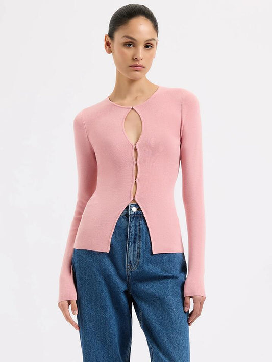 Image of a model wearing Tops. Productname: Nude Lucy Simone Knit Top - Peony in Peony colour by brand - Nude Lucy