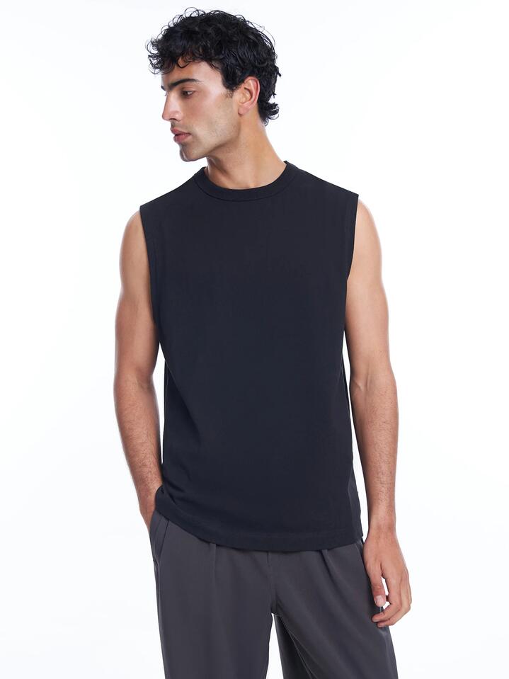 Image of a model wearing Tops. Productname: Article One Heavyweight Muscle in Black colour by brand - Article One