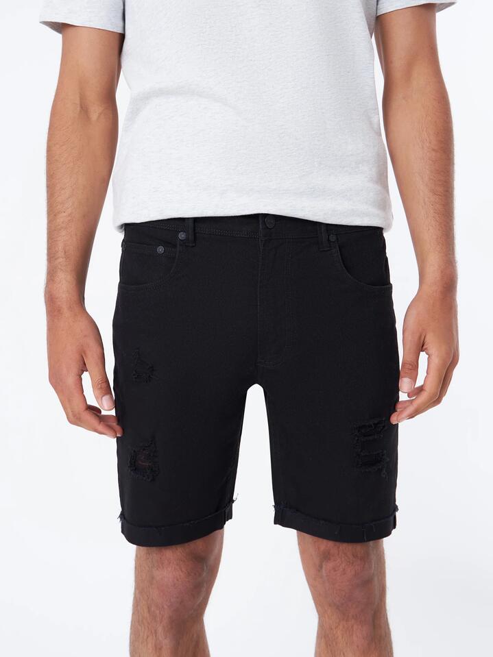 Image of a model wearing Denim. Productname: Article One Zane Skinny Denim Short - True Black Rip in True Black Rip colour by brand - Article One