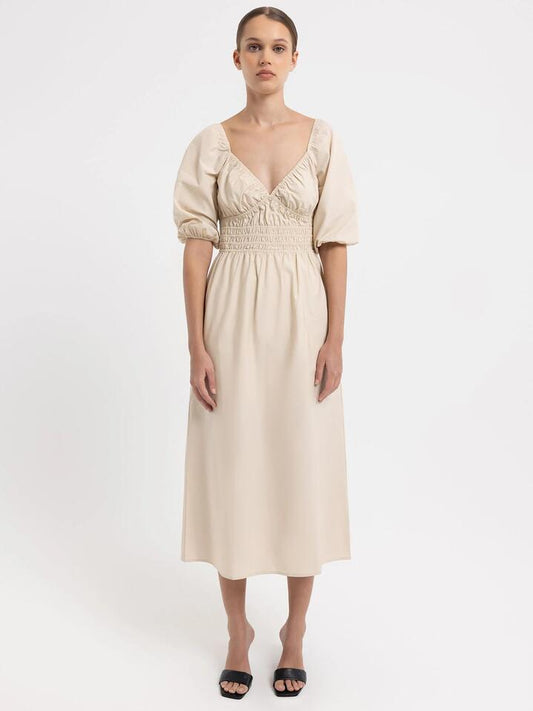 Image of a model wearing Dress. Productname: Lulu & Rose Savannah Midi Dress in Beige colour by brand - Lulu & Rose