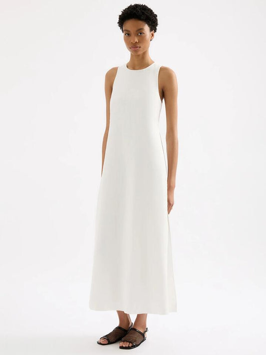 Image of a model wearing Dress. Productname: Nude Lucy Thilda Linen Maxi Dress in White colour by brand - Nude Lucy