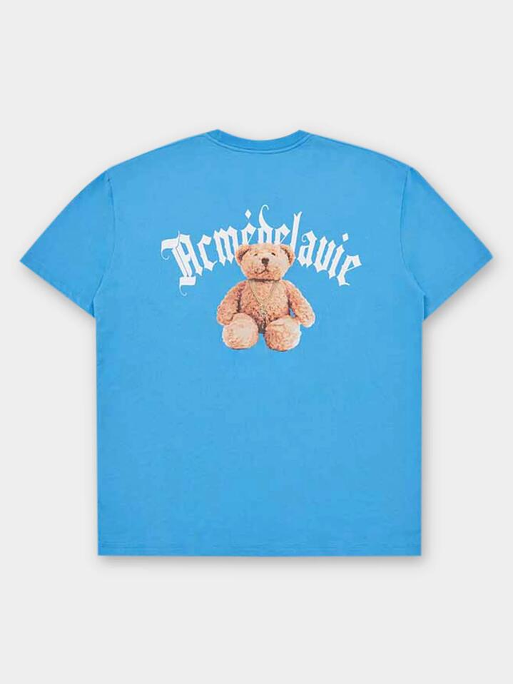 Image of a model wearing Tops. Productname: ADLV Gold Chain Bear Doll Tee in Blue colour by brand - ADLV