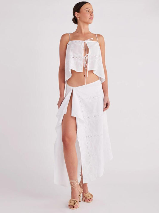 Image of a model wearing Skirts. Productname: SNDYS Asta Handkerchief Skirt in White colour by brand - SNDYS