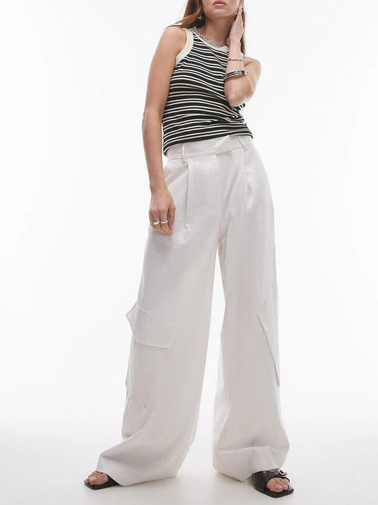 Image of a model wearing Pants. Productname: Topshop Wide Leg Linen Trouser Pockets in White colour by brand - Topshop