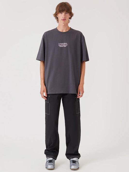 Image of a model wearing Tops. Productname: Barney Cools Discotheque Tee in Pigment Black colour by brand - Barney Cools