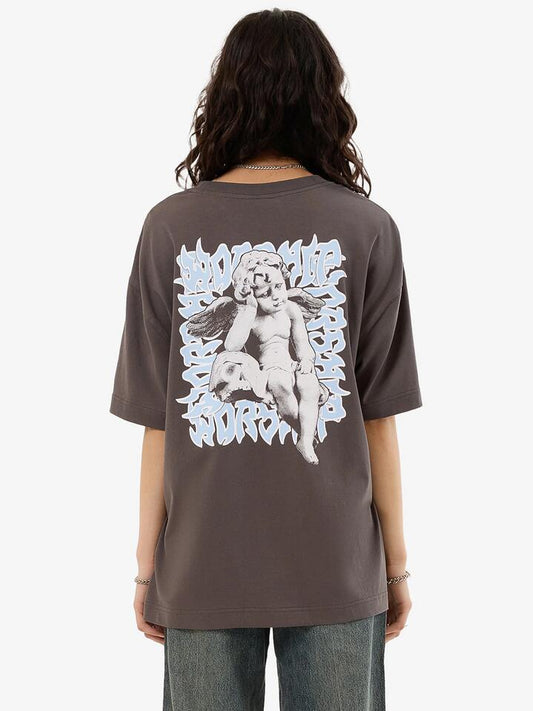 Image of a model wearing Tops. Productname: Worship Mortality Relaxed Tee in Worn Black colour by brand - Worship