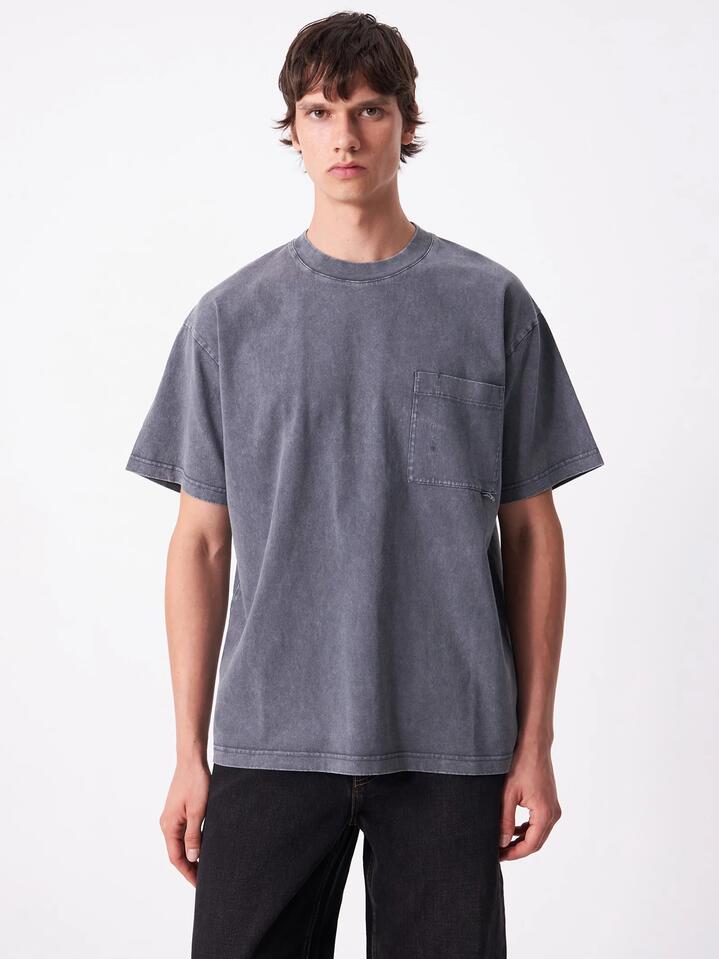 Image of a model wearing Tops. Productname: Article One Sayo Pocket Tee in Cement colour by brand - Article One