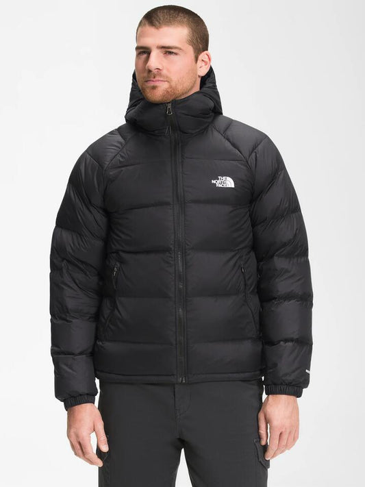 Image of a model wearing Outerwear. Productname: The North Face Hyalite Down Hooded Jacket in Black colour by brand - The North Face