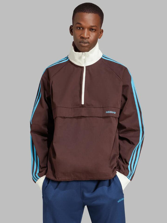 Image of a model wearing Outerwear. Productname: Adidas Pullover Jacket in Shadow Brown colour by brand - Adidas