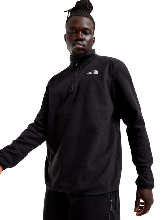 Image of a model wearing Outerwear. Productname: The North Face 100 Glacier 1/4 Zip Fleece in Tnf Black colour by brand - The North Face