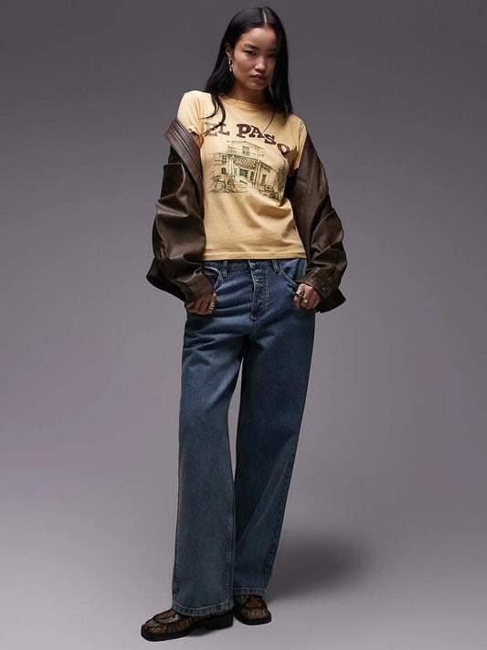 Image of a model wearing Tops. Productname: Topshop El Paso Tee in Ivory colour by brand - Topshop