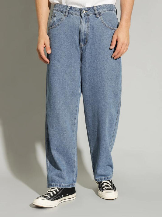 Image of a model wearing Denim. Productname: Xlarge Bull 91 Jeans in Mid Blue colour by brand - Xlarge