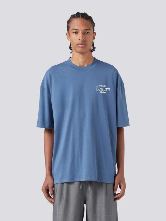 Image of a model wearing Tops. Productname: Barney Cools PC Tee in Washed Blue colour by brand - Barney Cools