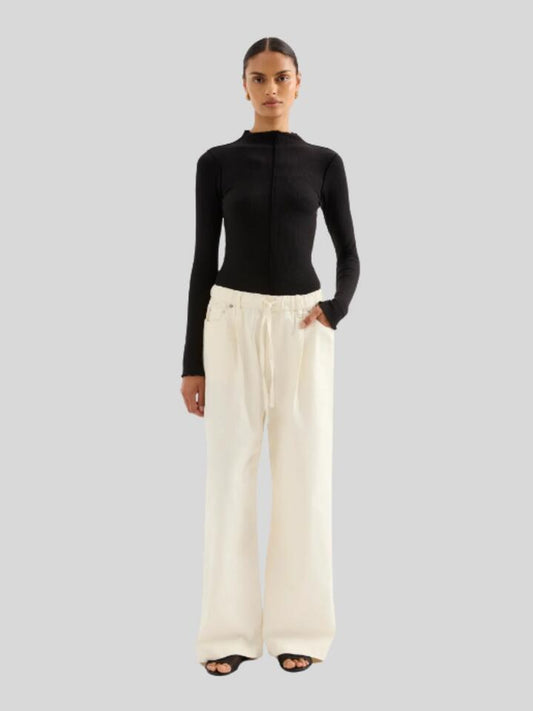 Image of a model wearing Denim. Productname: Nude Lucy Esme Drawstring Jean in Natural colour by brand - Nude Lucy
