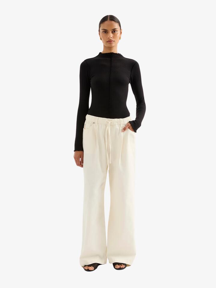 Image of a model wearing Pants. Productname: Nude Lucy Esme Drawstring Jean in Natural colour by brand - Nude Lucy